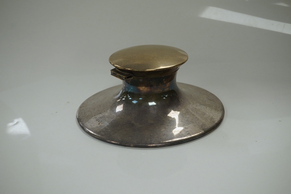 A George V silver mounted capstan inkwell, maker's mark rubbed, Birmingham, 1921, base diameter 15.5cm. Condition - good